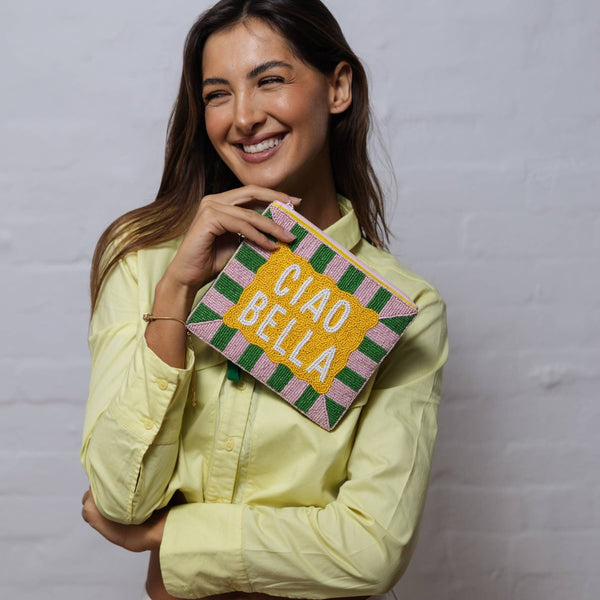 Beaded Ciao Bella Purse (yellow, green, pink and white beads). It has a zip top closure and a detachable wrist strap.