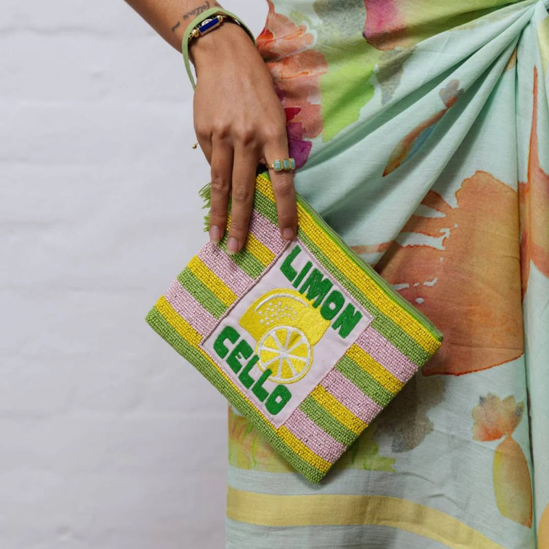 Beaded Limon Cello Purse with beaded yellow, green and lilac stripes and the words Limon Cello on the front.