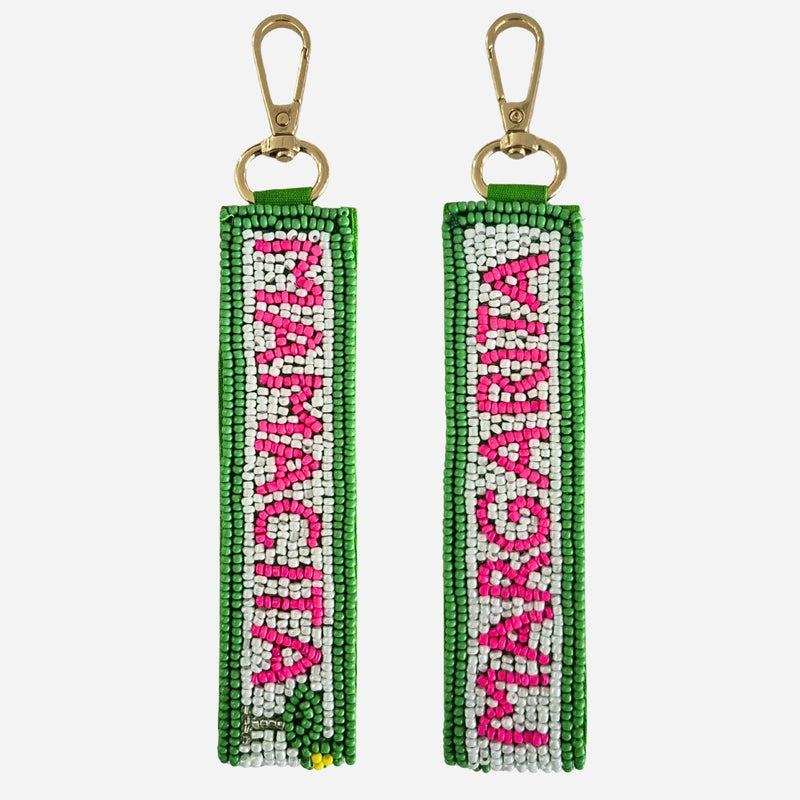 Beaded Mamacita Key Chain - it has 'margarita' on one side and 'mamacita' on the other side. Green, white and pink beads.