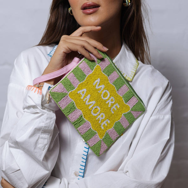 Beaded More Amore Purse with a checker border (green, pink) and More Amore on the front (yellow, white).